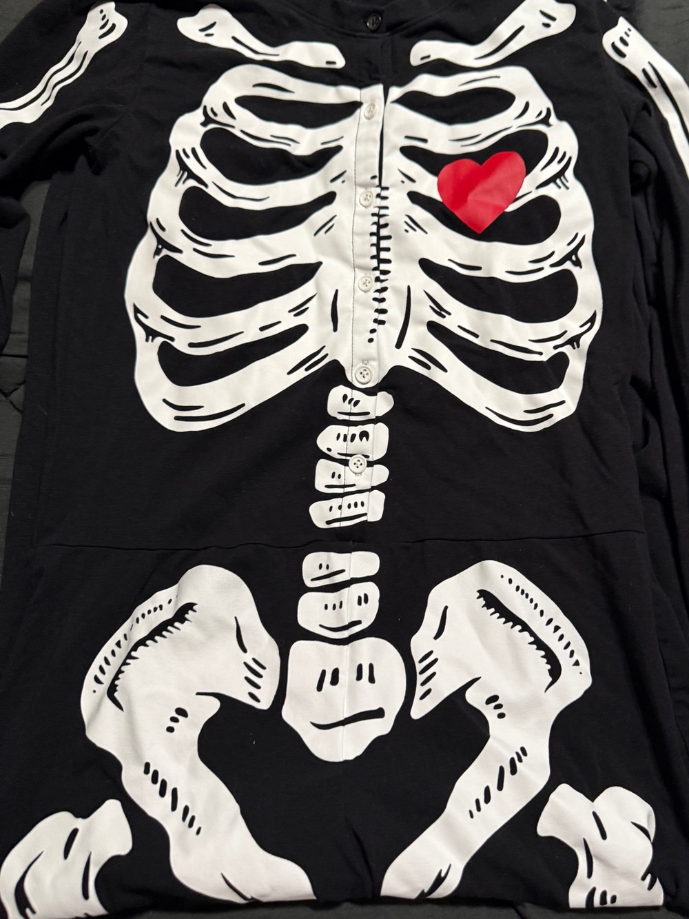 Old Navy Black Pajama one-piece with White Skeleton Print and Red Heart